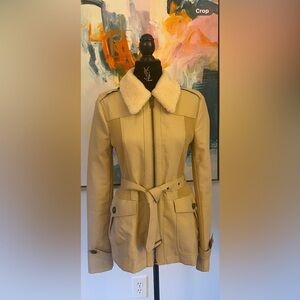Burberry Brit trench jacket with removable shearling collar. Color beige.